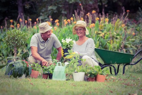 Gardening tools and community garden signifying organisational commitment