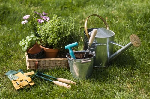 Gardener preparing a front yard tidy-up in an inner-city terrace